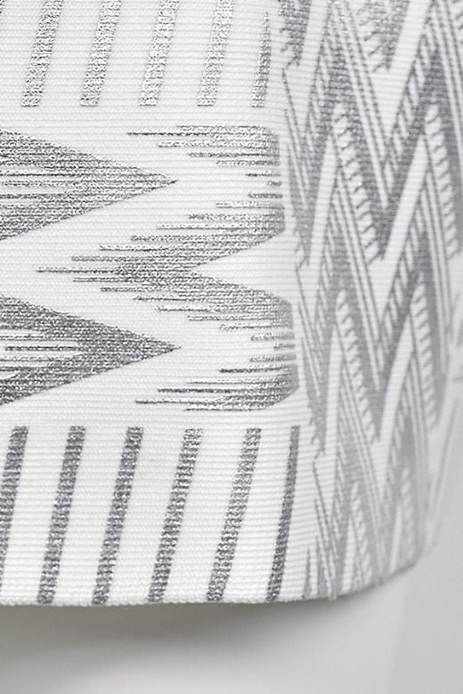 Woman wearing a figure flattering  High Waist Metallic Leather Mini Skirt - Silver BODYCON COLLECTION