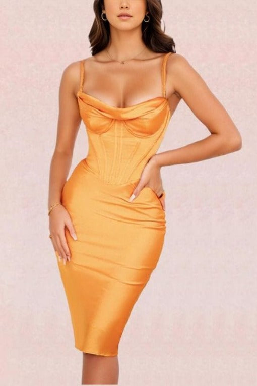 Woman wearing a figure flattering  Indi Bodycon Dress - Apricot Orange BODYCON COLLECTION