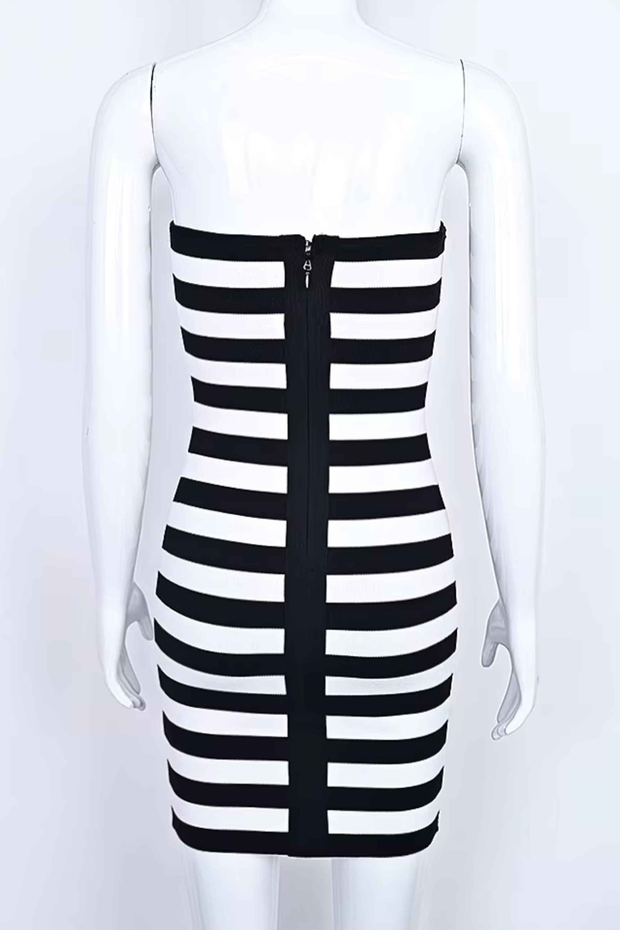Woman wearing a figure flattering  Ingrid Bandage Mini Dress - Classic Black BODYCON COLLECTION