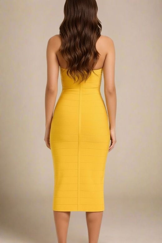 Woman wearing a figure flattering  Isabella Bandage Midi Dress - Mustard Yellow BODYCON COLLECTION Pty Ltd