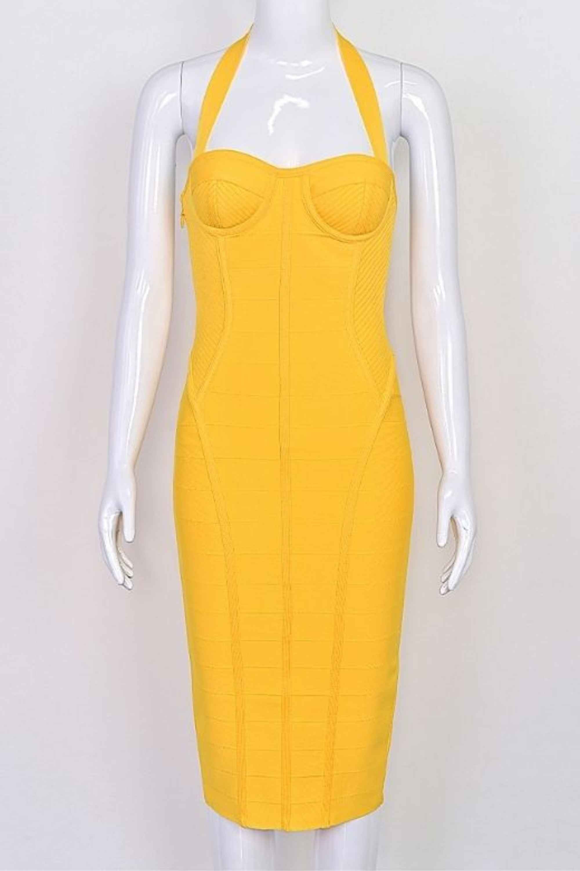 Woman wearing a figure flattering  Isabella Bandage Midi Dress - Mustard Yellow BODYCON COLLECTION Pty Ltd