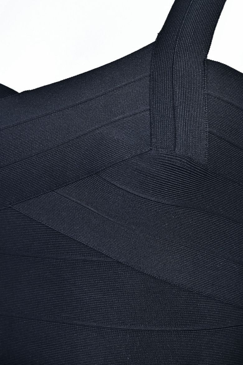 Woman wearing a figure flattering  Jay Bandage Crop Top - Classic Black BODYCON COLLECTION