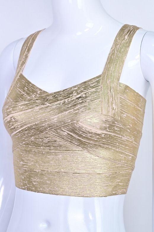 Woman wearing a figure flattering  Jay Bandage Leather Crop Top - Gold BODYCON COLLECTION