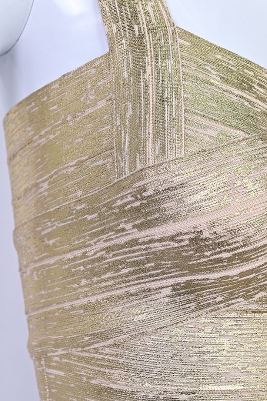 Woman wearing a figure flattering  Jay Bandage Leather Crop Top - Gold BODYCON COLLECTION