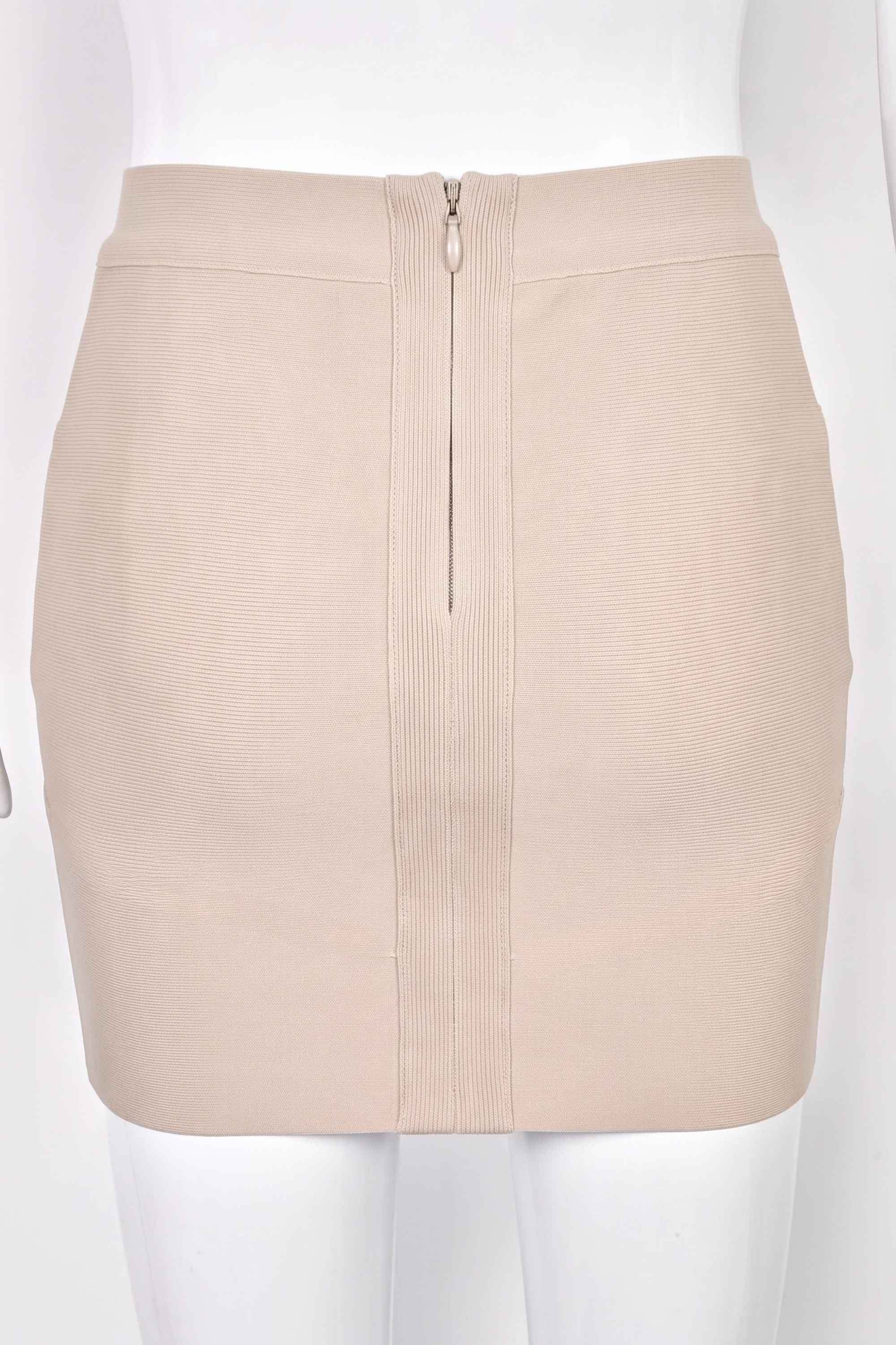 Woman wearing a figure flattering  Jay High Waist Bandage Mini Skirt - Cream BODYCON COLLECTION