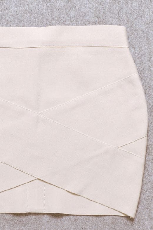 Woman wearing a figure flattering  Jay High Waist Bandage Mini Skirt - Cream BODYCON COLLECTION