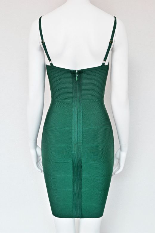 Woman wearing a figure flattering  Jene Bandage Dress - Emerald Green BODYCON COLLECTION