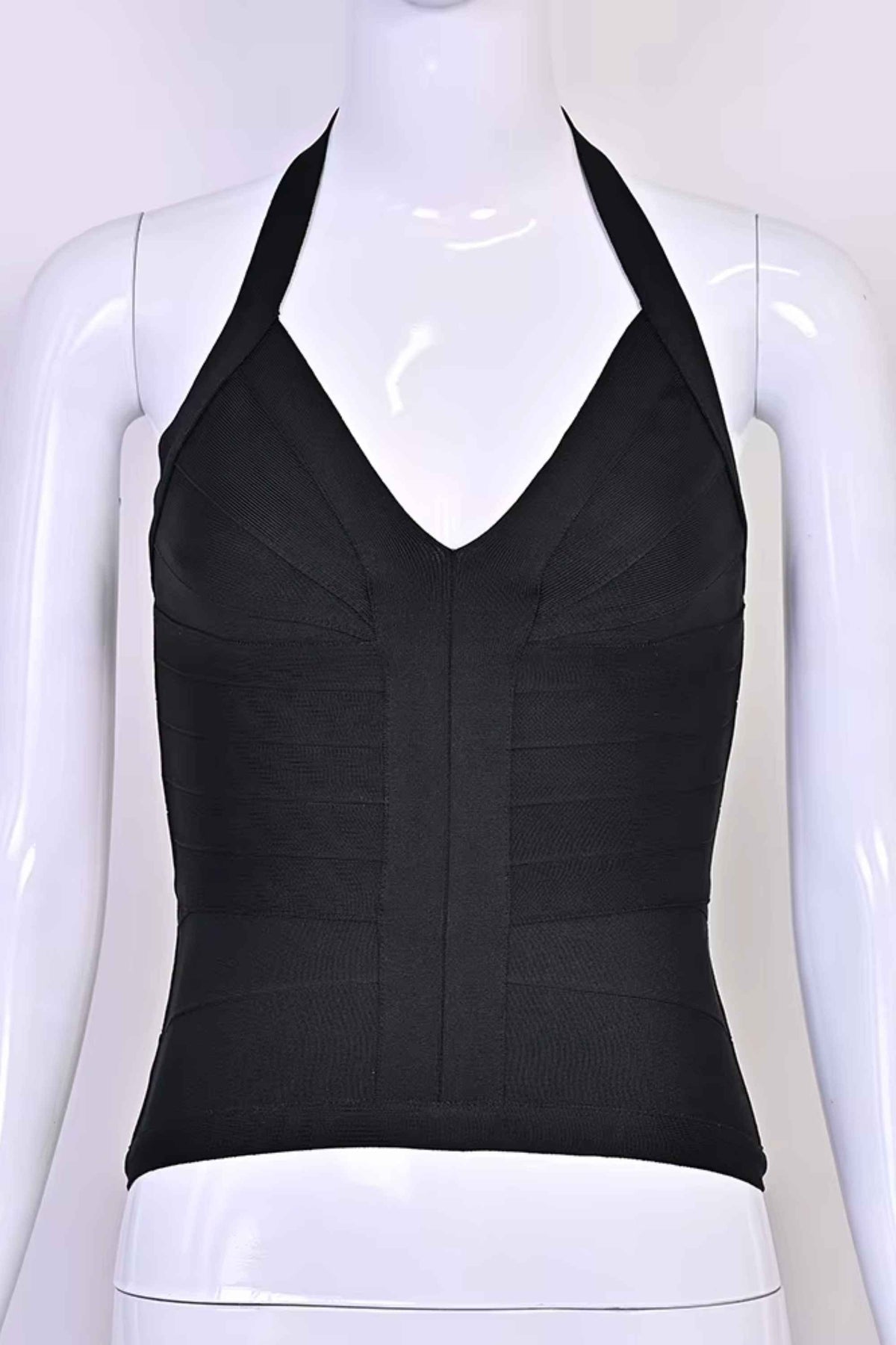 Woman wearing a figure flattering  Jenna Bandage Top - Classic Black BODYCON COLLECTION Pty Ltd
