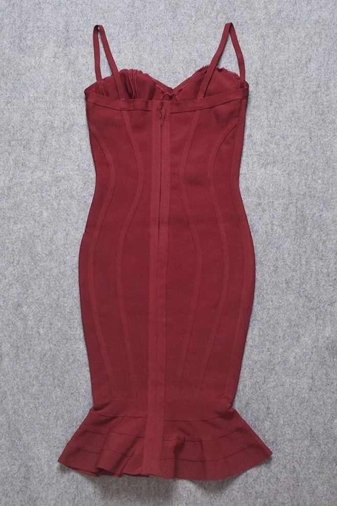 Woman wearing a figure flattering  Joy Bandage Midi Dress - Red Wine Bodycon Collection