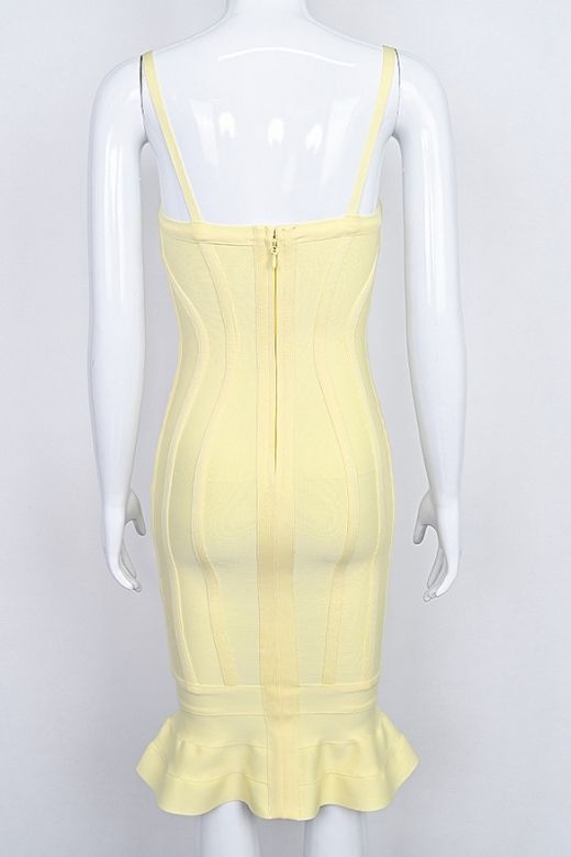 Woman wearing a figure flattering  Joy Bandage Midi Dress - Sun Yellow Bodycon Collection