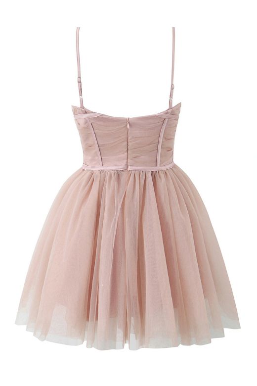 Woman wearing a figure flattering  Kaya Bodycon Mini Wrap Tulle Dress - Oyster Pink BODYCON COLLECTION