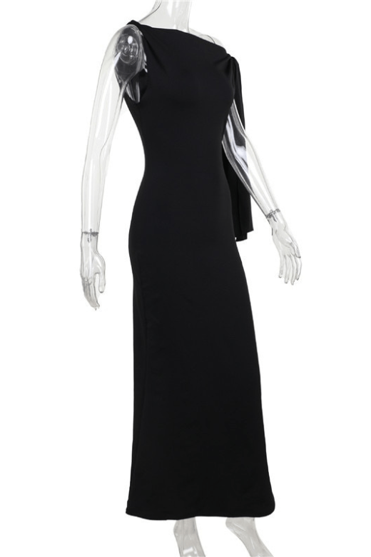 Woman wearing a figure flattering  Kelly Bodycon Maxi Dress - Classic Black BODYCON COLLECTION
