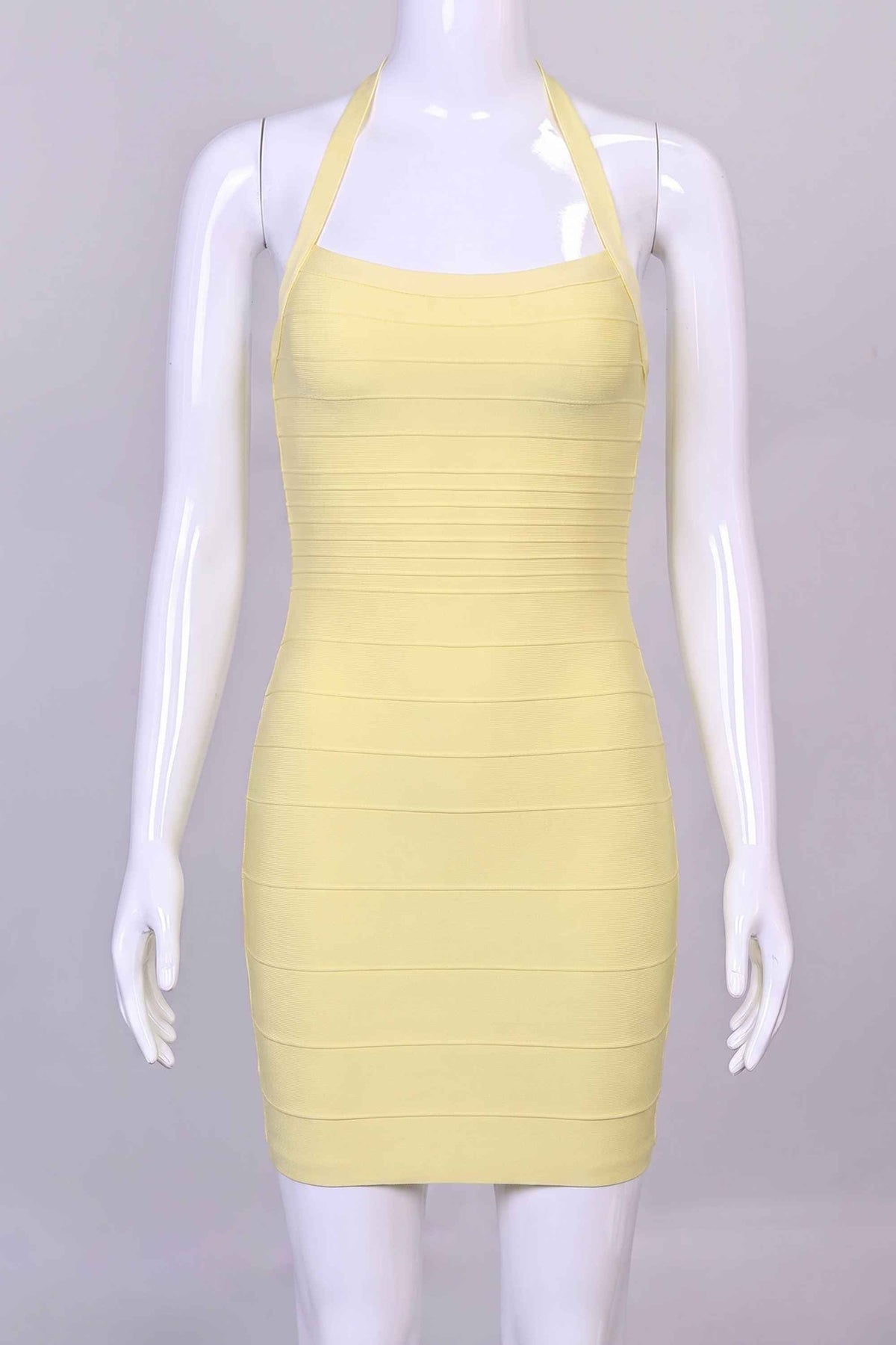 Woman wearing a figure flattering  Kia Bandage Mini Dress - Butter Yellow BODYCON COLLECTION Pty Ltd
