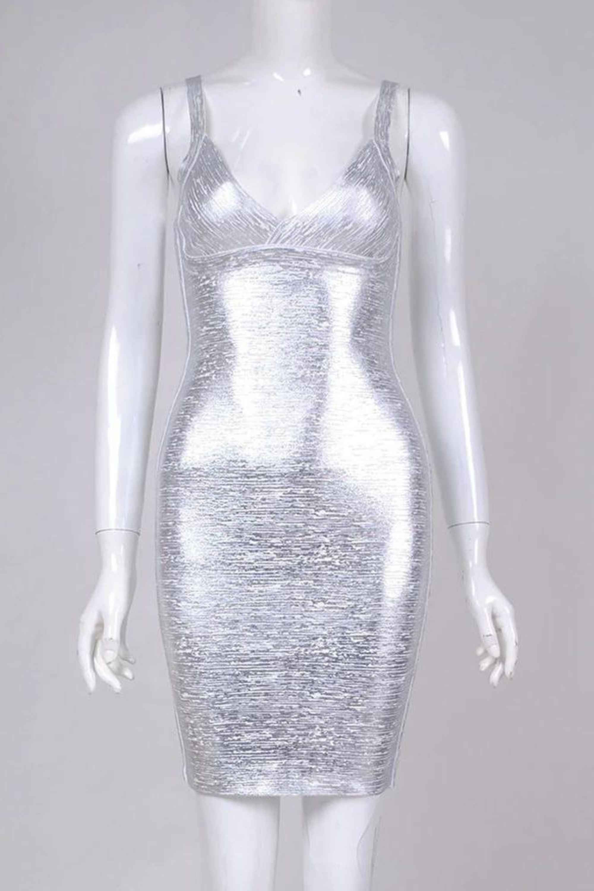 Woman wearing a figure flattering  Kit Bandage Dress - Silver Bodycon Collection