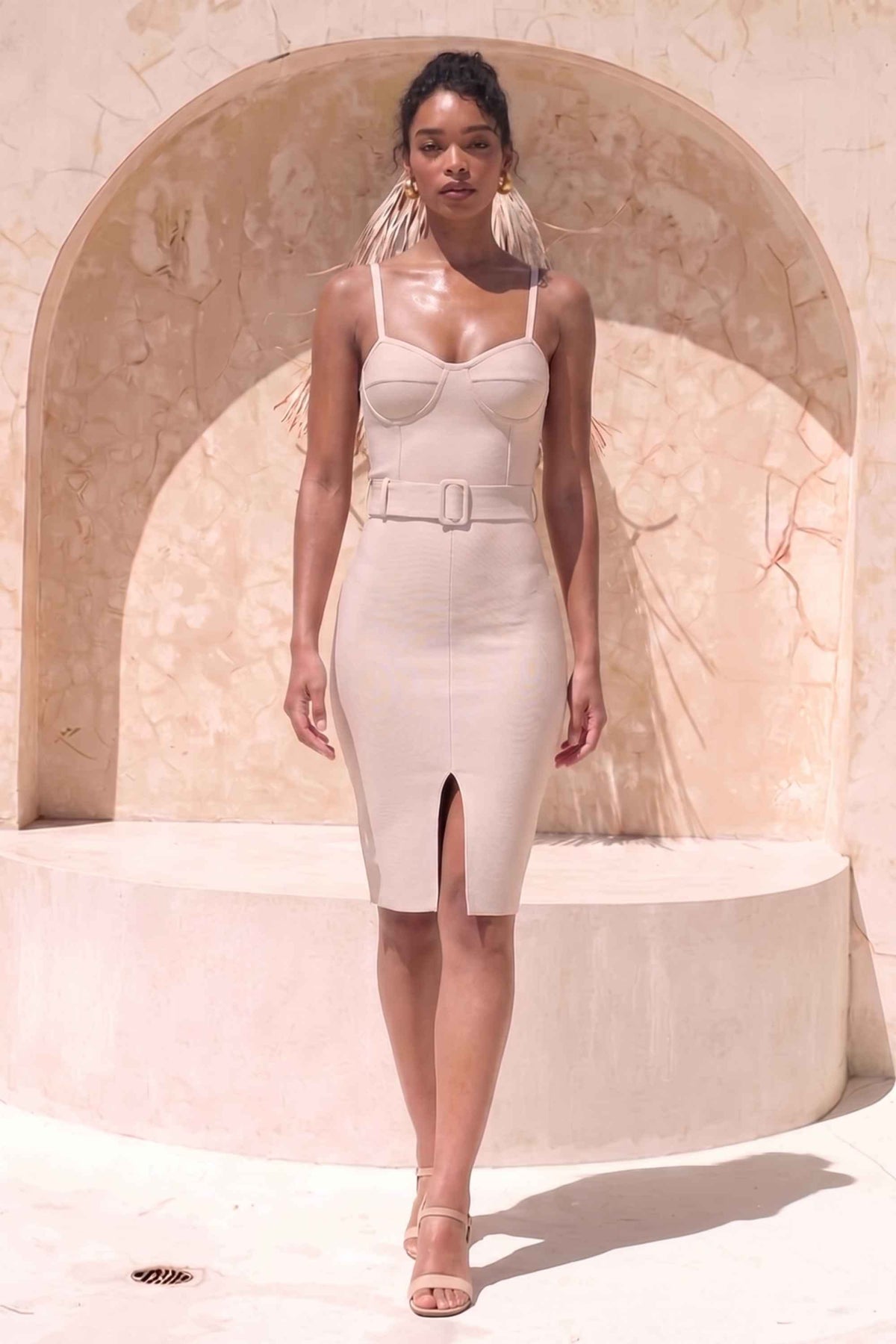 Woman wearing a figure flattering  Lana Bandage Dress - Cream BODYCON COLLECTION Pty Ltd