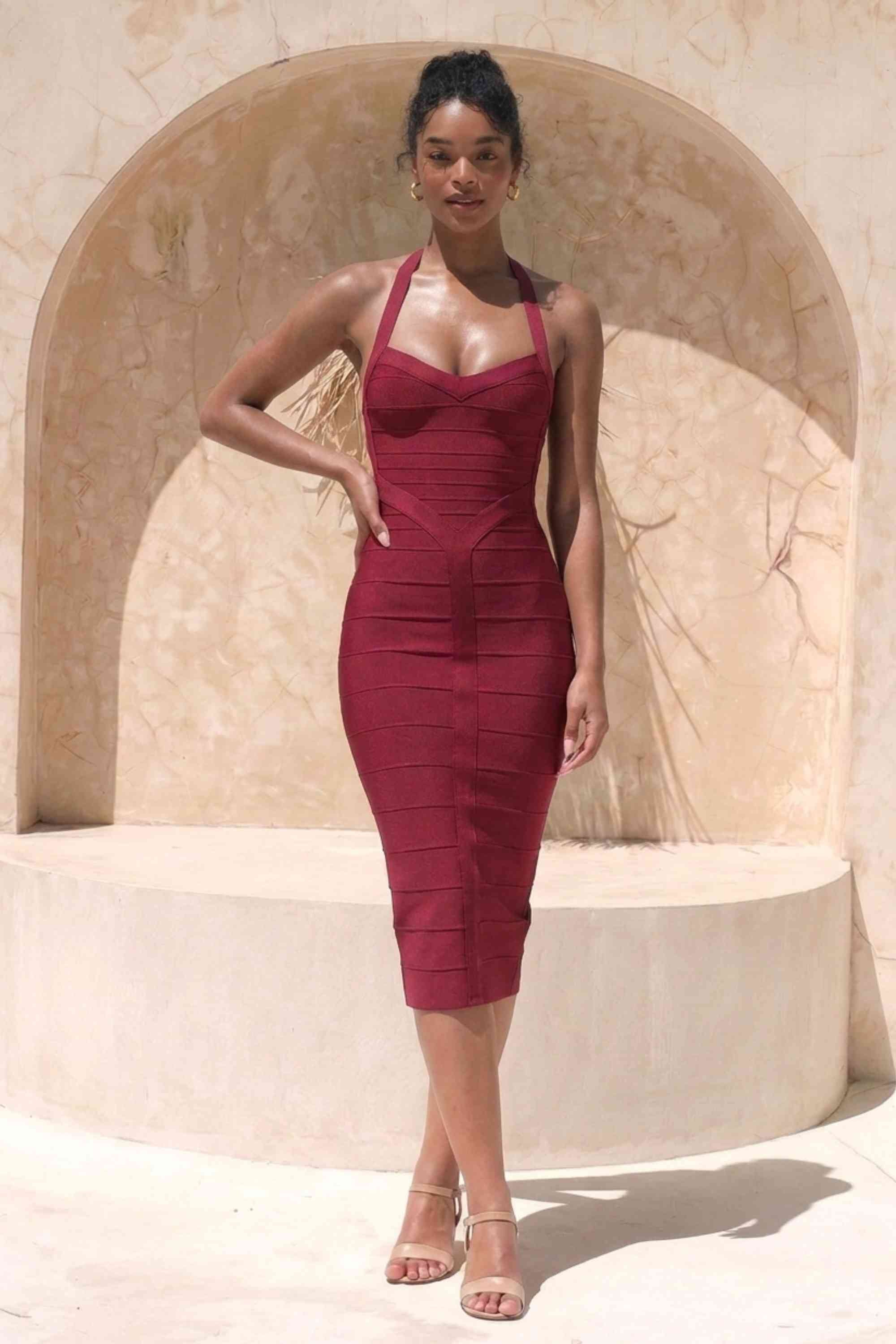 Woman wearing a figure flattering  Lara Bandage Midi Dress - Red Wine BODYCON COLLECTION Pty Ltd