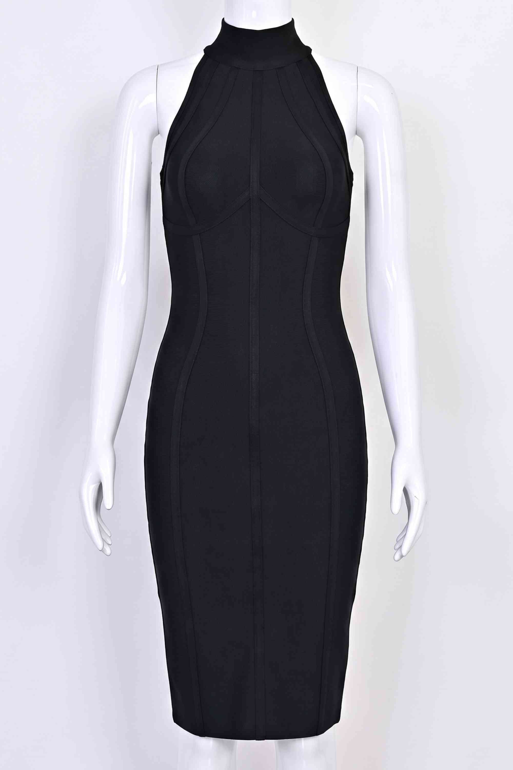 Woman wearing a figure flattering  Lea Bandage Midi Dress - Classic Black Bodycon Collection