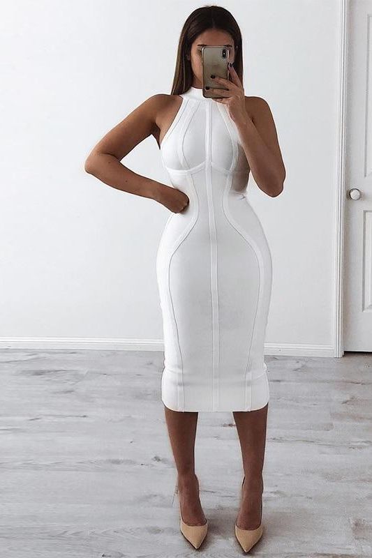 Woman wearing a figure flattering  Lea Bandage Midi Dress - Pearl White Bodycon Collection