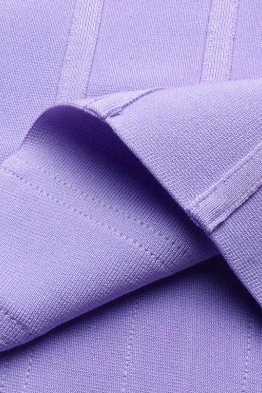 Woman wearing a figure flattering  Leah Bodycon Dress - Violet Purple Bodycon Collection