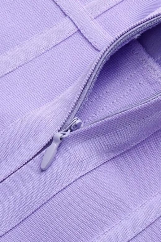 Woman wearing a figure flattering  Leah Bodycon Dress - Violet Purple Bodycon Collection