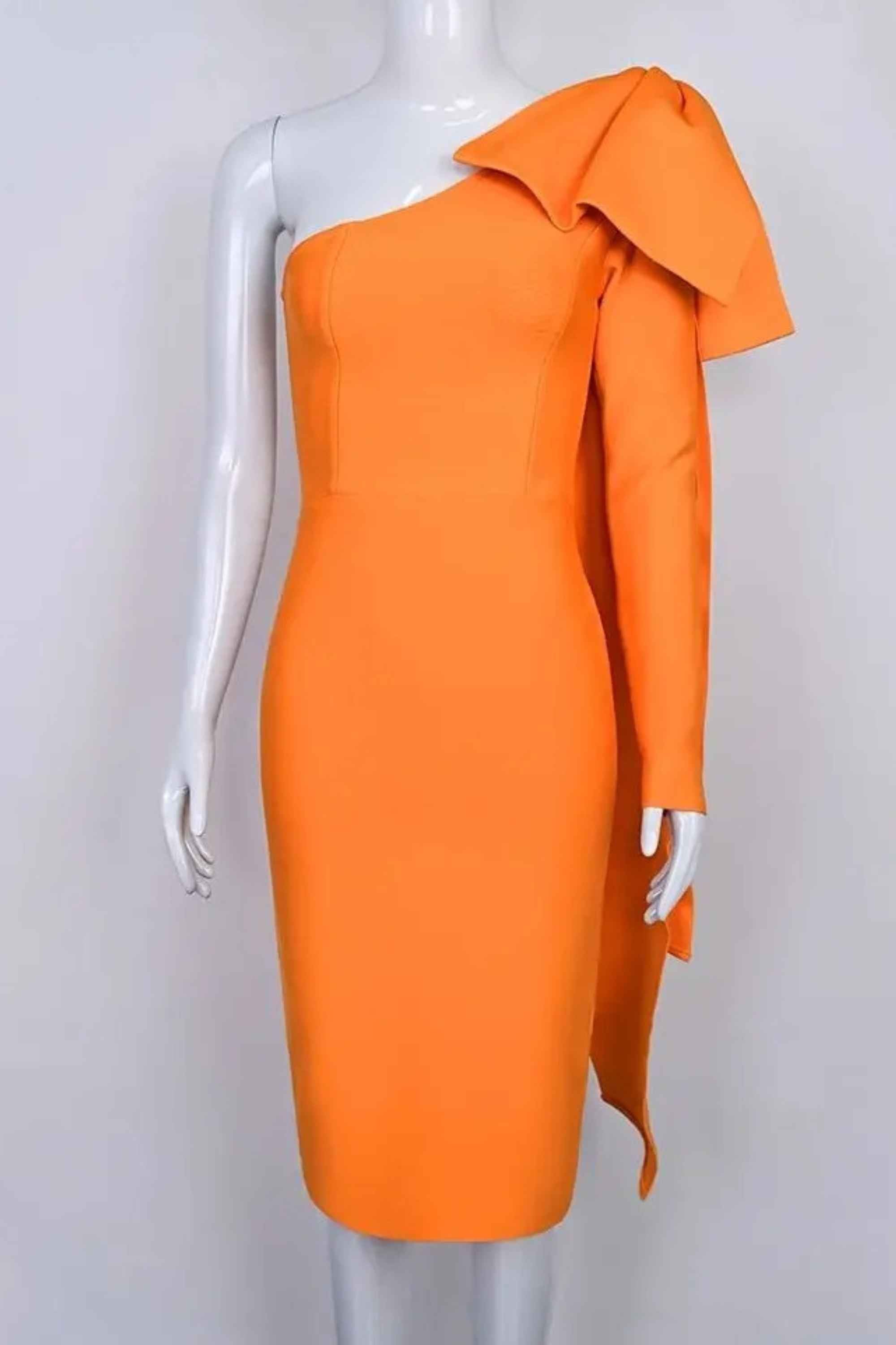 Woman wearing a figure flattering  Lela Long Sleeve Bandage Midi Dress - Apricot Orange BODYCON COLLECTION