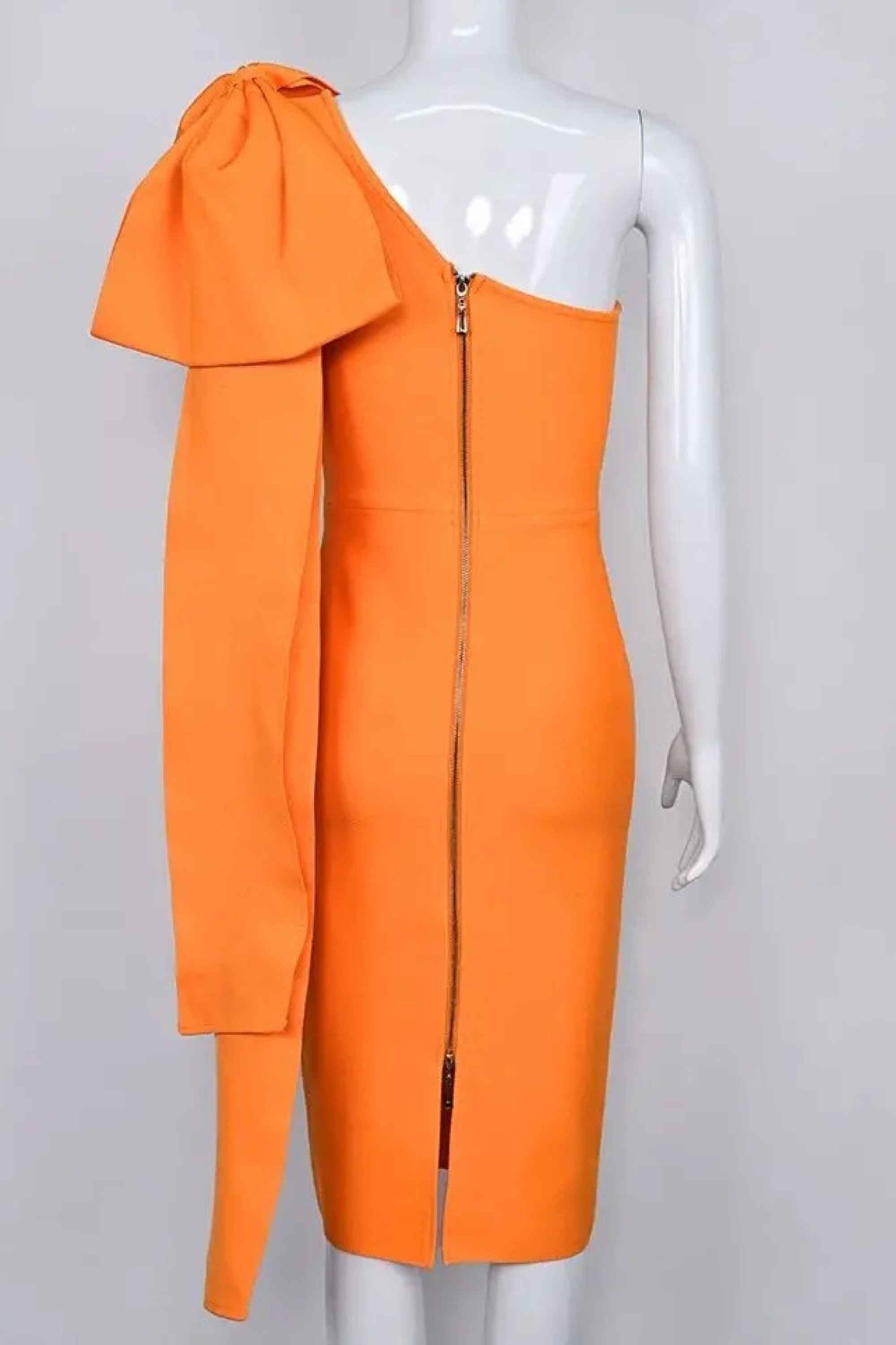 Woman wearing a figure flattering  Lela Long Sleeve Bandage Midi Dress - Apricot Orange BODYCON COLLECTION