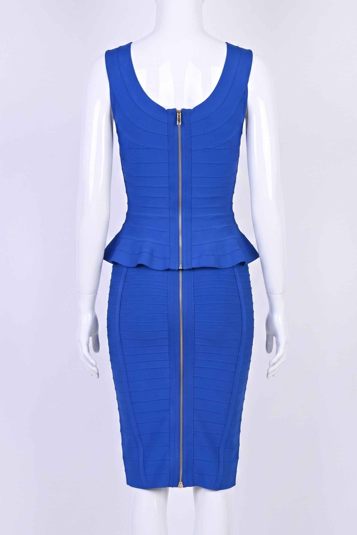 Woman wearing a figure flattering  Leni Bandage Top and Knee Length Skirt Set - Royal Blue BODYCON COLLECTION