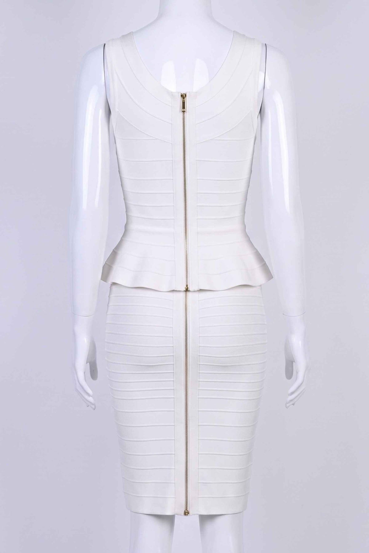 Woman wearing a figure flattering  Leni Bandage Top and Knee Length Skirt Set - White Pearl BODYCON COLLECTION