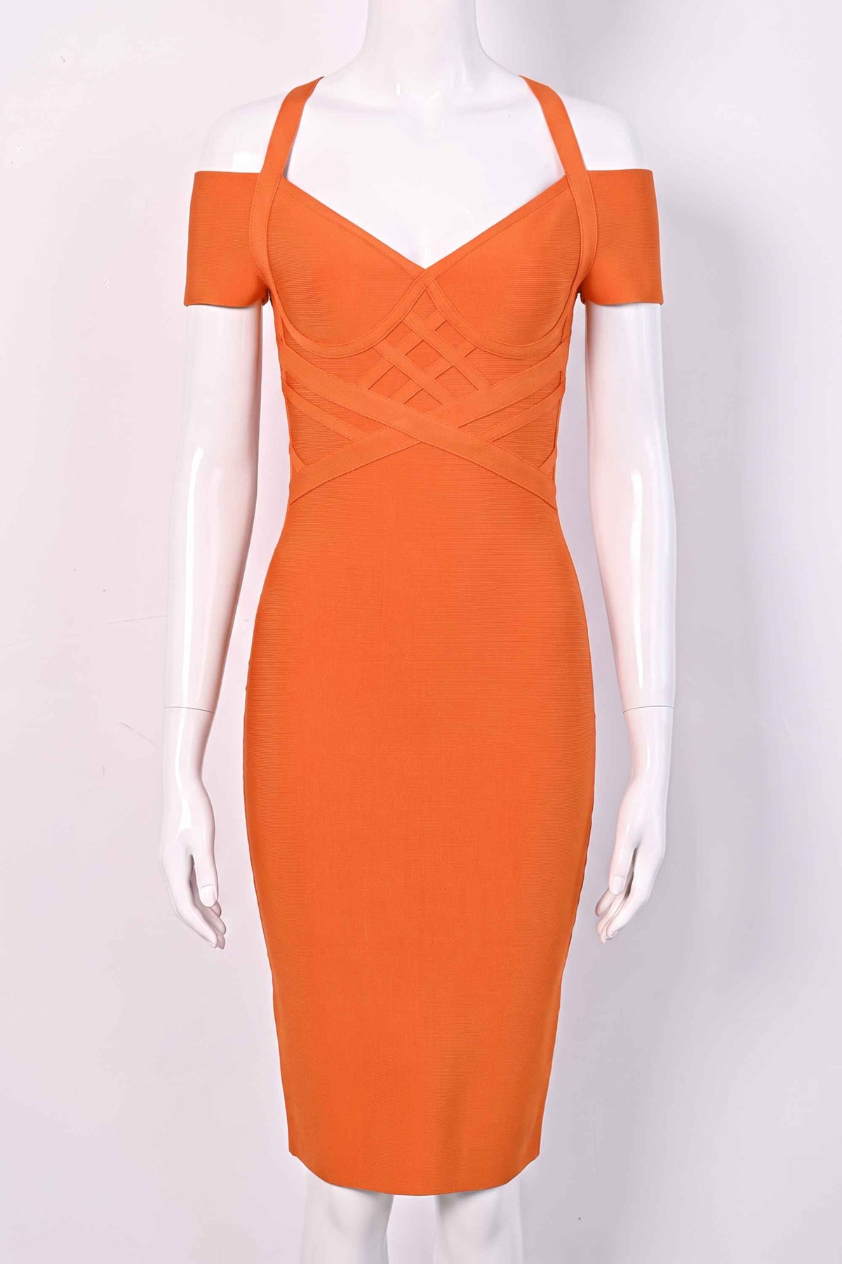 Woman wearing a figure flattering  Leo Bandage Midi Dress - Apricot Orange Bodycon Collection