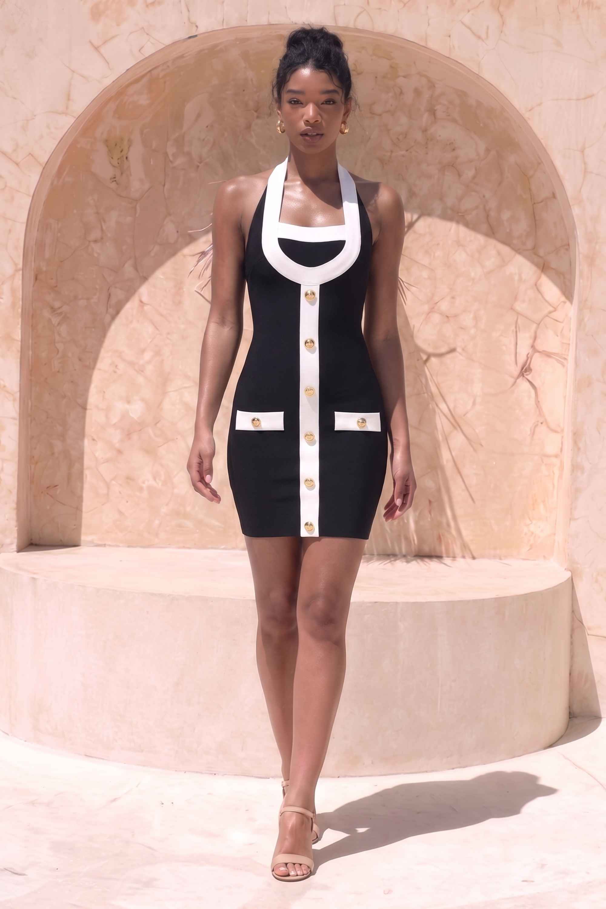 Woman wearing a figure flattering  Leone Bandage Mini Dress - Classic Black BODYCON COLLECTION Pty Ltd