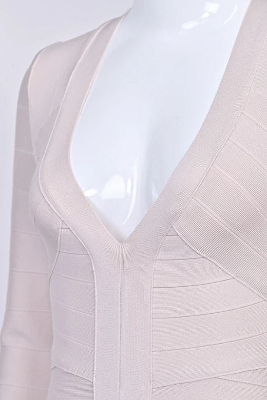Woman wearing a figure flattering  Lisa Long Sleeve Bandage Mini Dress - Cream BODYCON COLLECTION Pty Ltd