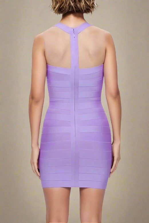 Woman wearing a figure flattering  Mara Bandage Mini Dress - Violet Purple BODYCON COLLECTION