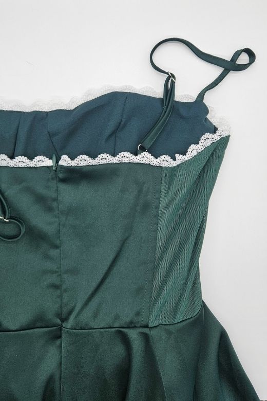 Woman wearing a figure flattering  Mavis Midi Dress - Emerald Green BODYCON COLLECTION