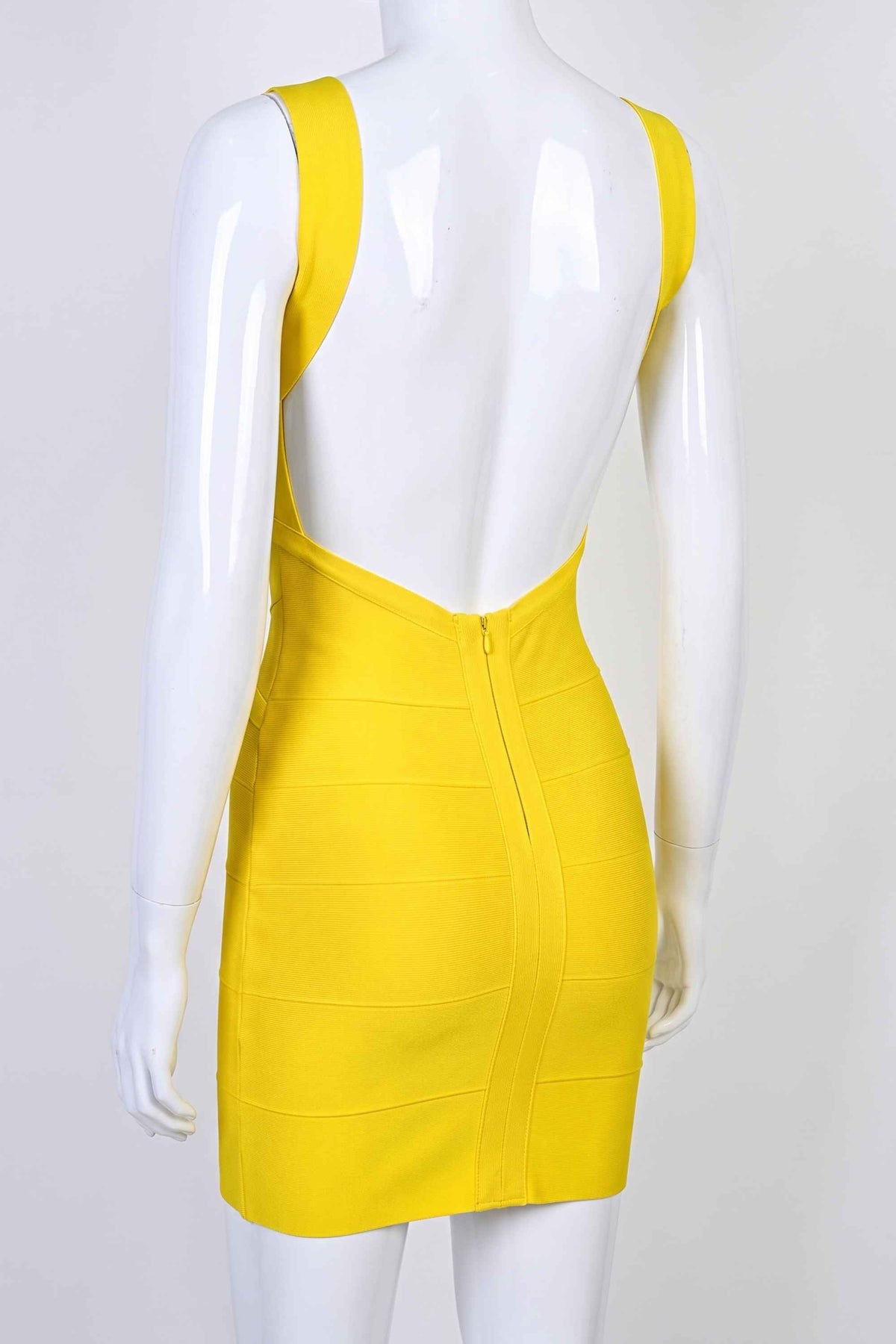 Woman wearing a figure flattering  Maya Bandage Mini Dress - Sun Yellow BODYCON COLLECTION