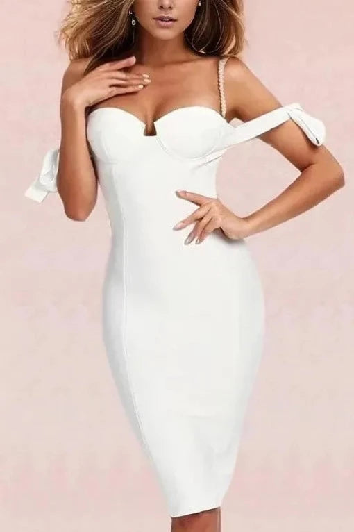 Woman wearing a figure flattering  Mia Bandage Dress - Pearl White BODYCON COLLECTION