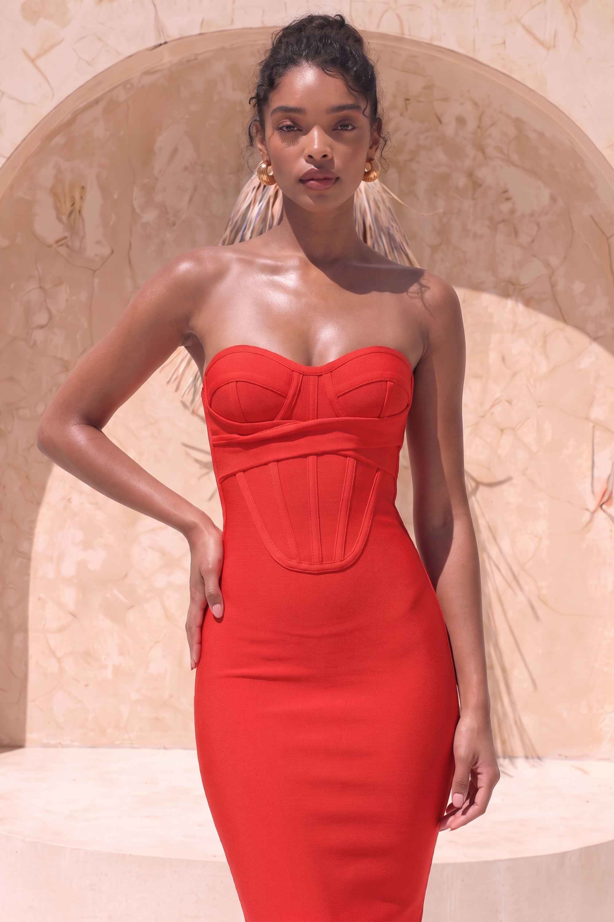 Woman wearing a figure flattering  Miles Bodycon Midi Dress - Lipstick Red BODYCON COLLECTION
