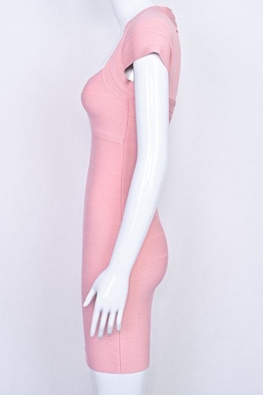 Woman wearing a figure flattering  Miranda Bandage Mini Dress - Ballet Pink Bodycon Collection