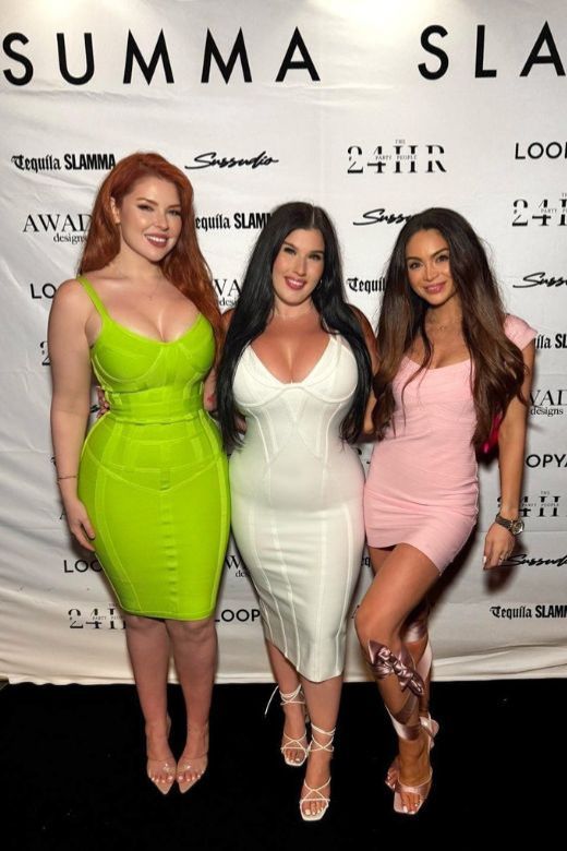 Woman wearing a figure flattering  Miranda Bandage Mini Dress - Dusty Pink Bodycon Collection