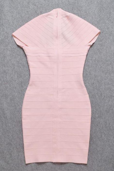 Woman wearing a figure flattering  Miranda Bandage Mini Dress - Dusty Pink Bodycon Collection