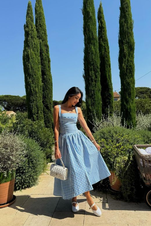 Woman wearing a figure flattering  Natalia Bodycon Day Midi Dress - Baby Blue BODYCON COLLECTION