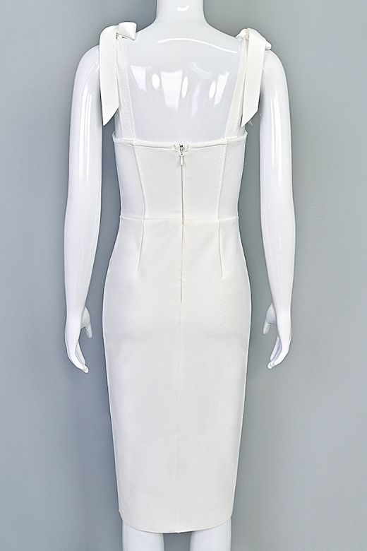 Woman wearing a figure flattering  Payton Bandage Dress - White Pearl BODYCON COLLECTION