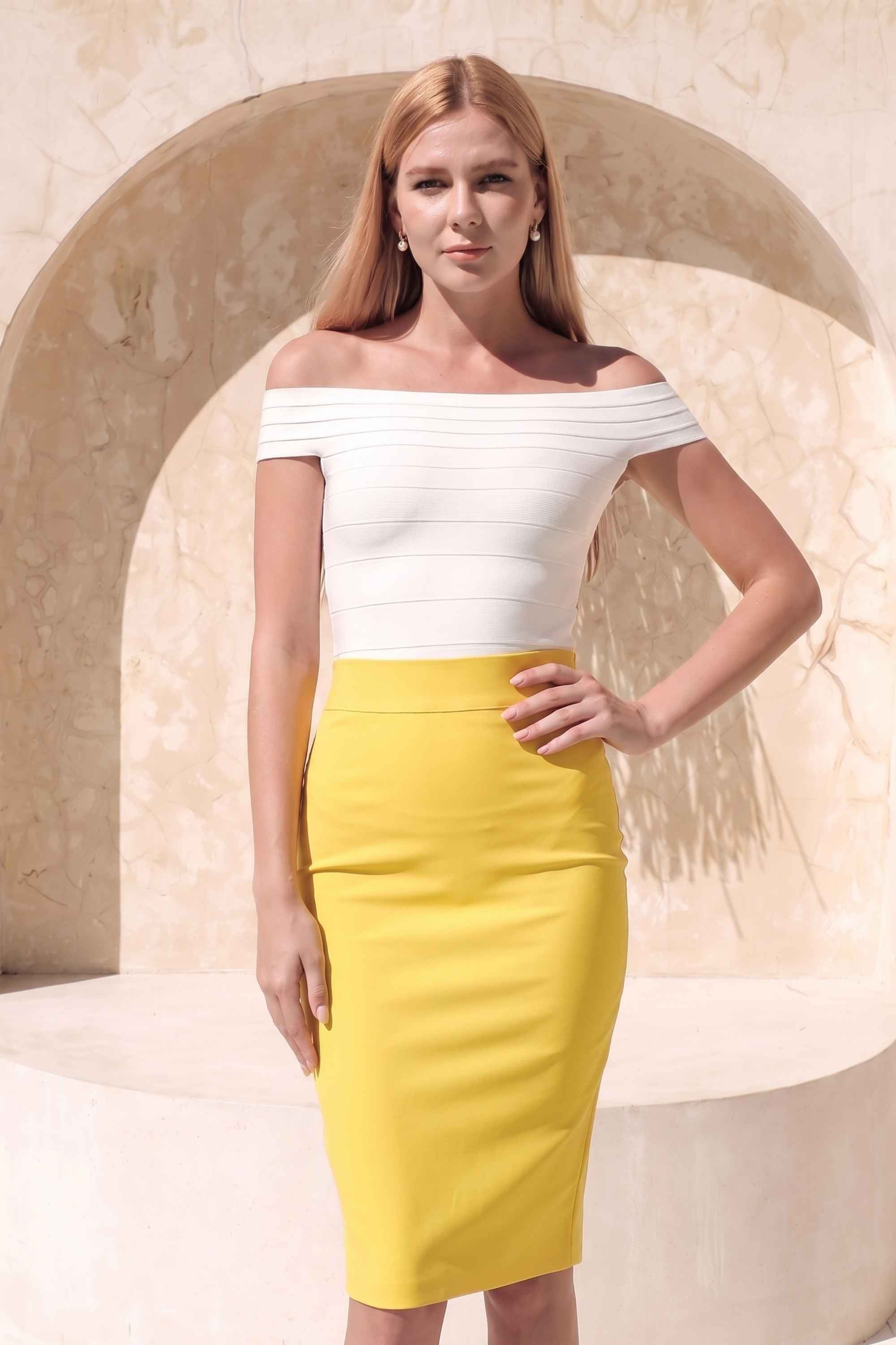 Woman wearing a figure flattering  Pencil High Waist Bandage Knee Length Skirt - Sun Yellow BODYCON COLLECTION