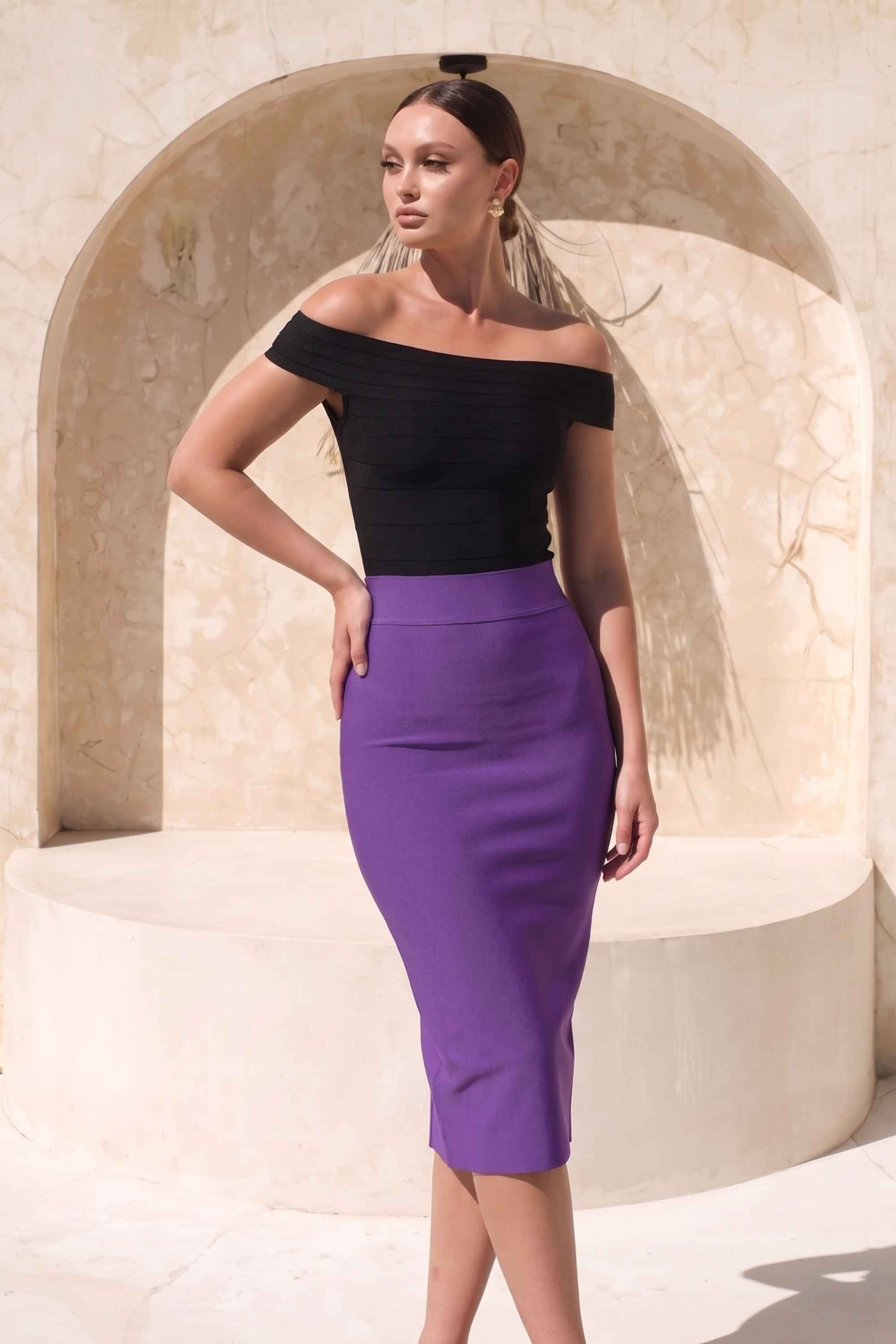 Woman wearing a figure flattering  Pencil High Waist Bandage Midi Skirt - Plum Purple BODYCON COLLECTION