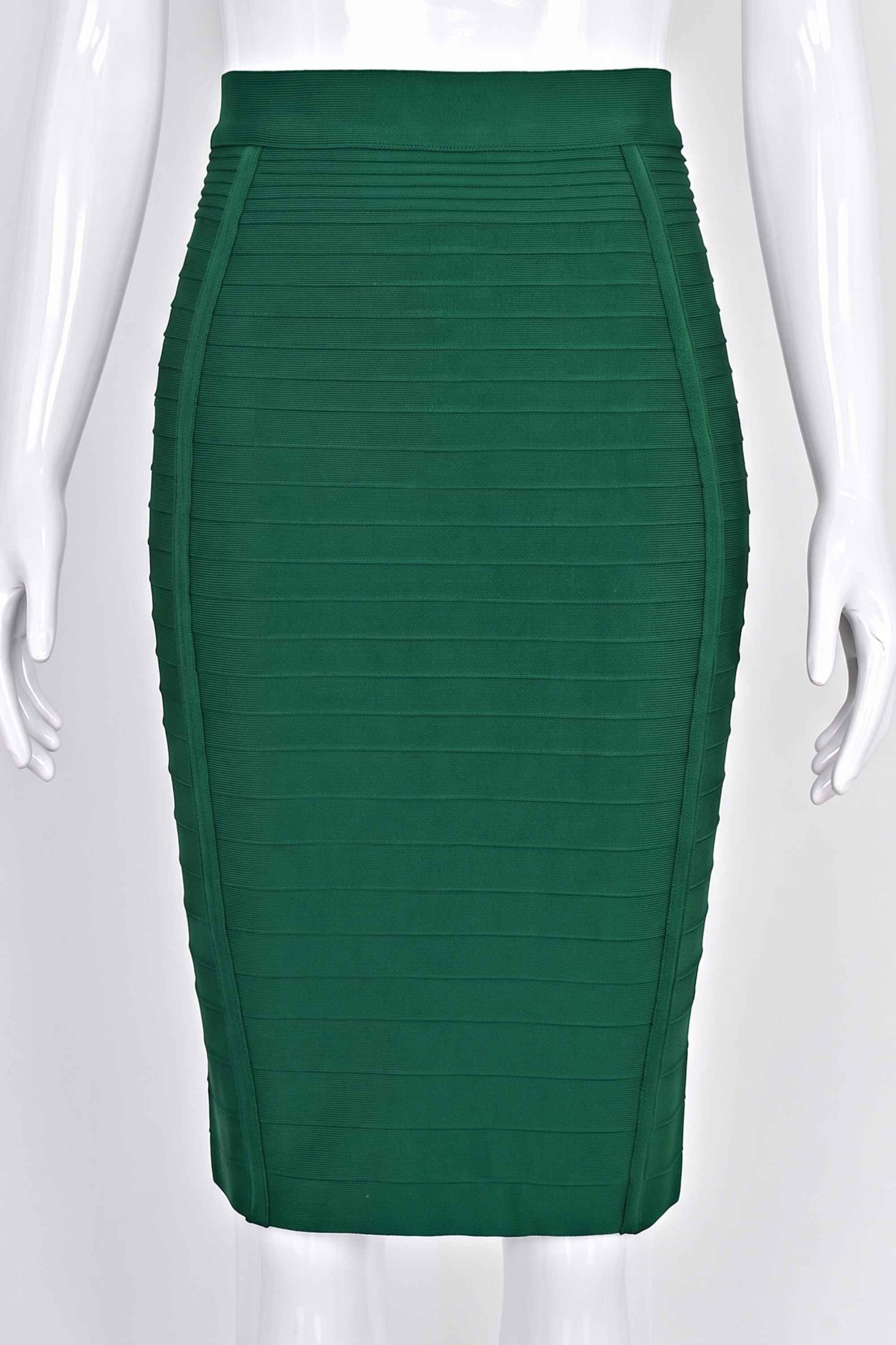 Woman wearing a figure flattering  Pencil High Waist Knitted Knee Length Skirt - Emerald Green BODYCON COLLECTION