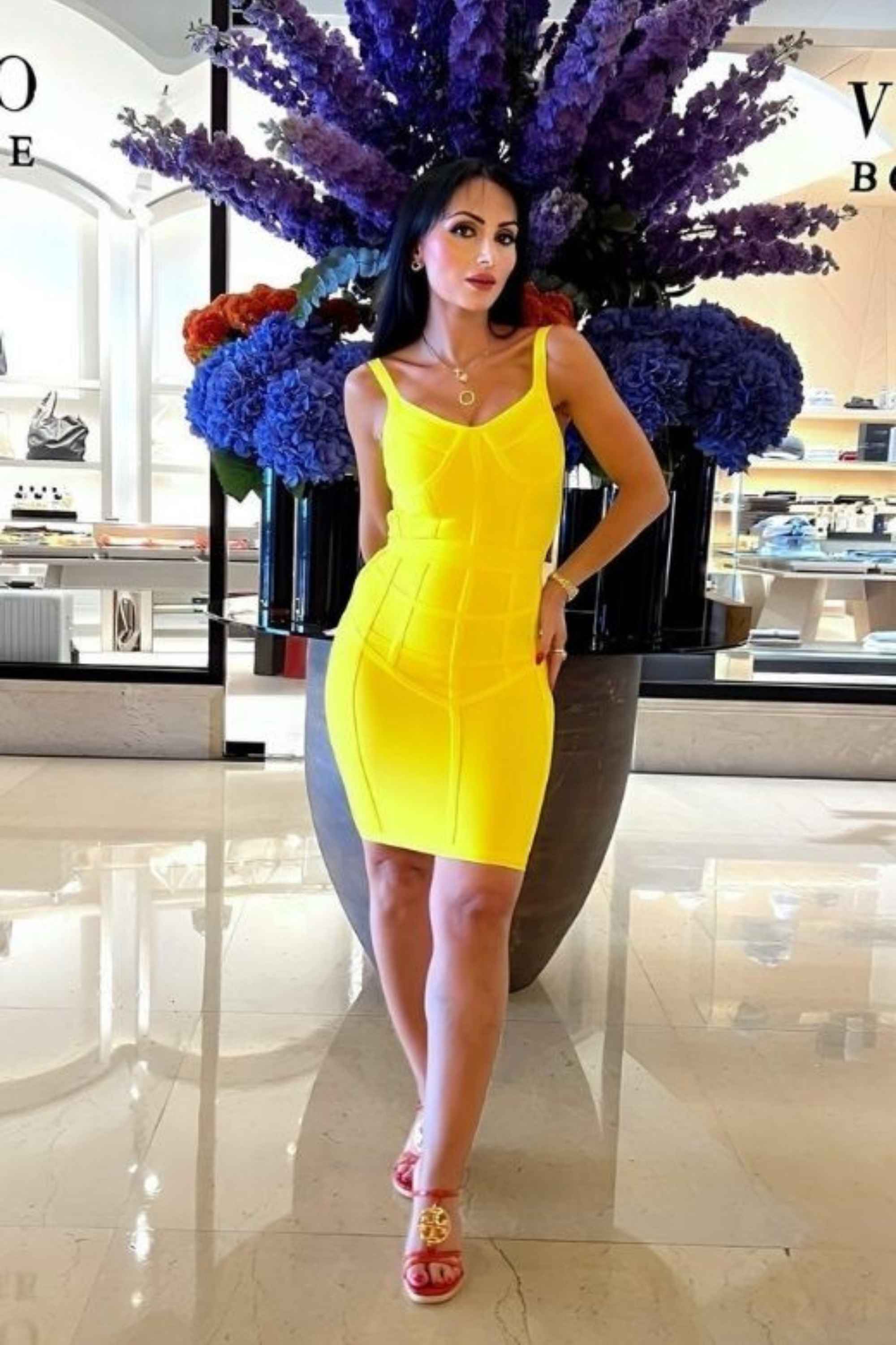 Woman wearing a figure flattering  Pip Bandage Mini Dress - Sun Yellow BODYCON COLLECTION