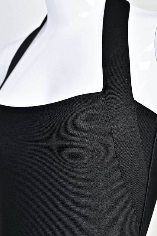 Woman wearing a figure flattering  Raya Bodycon Midi Dress - Classic Black BODYCON COLLECTION Pty Ltd