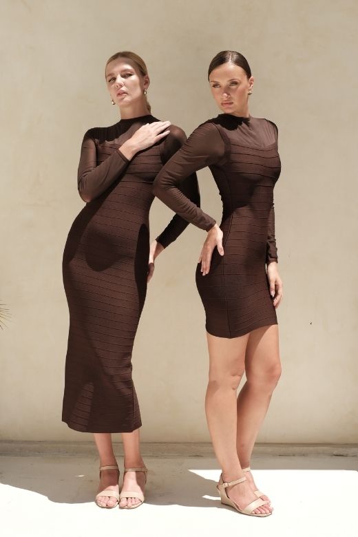 Woman wearing a figure flattering  Robin Long Sleeve Bandage Mini Dress - White Pearl BODYCON COLLECTION Pty Ltd