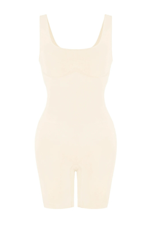 Woman wearing a figure flattering  Round Neck One Piece Bodysuit Shapewear - Mid Thigh Bodycon Collection