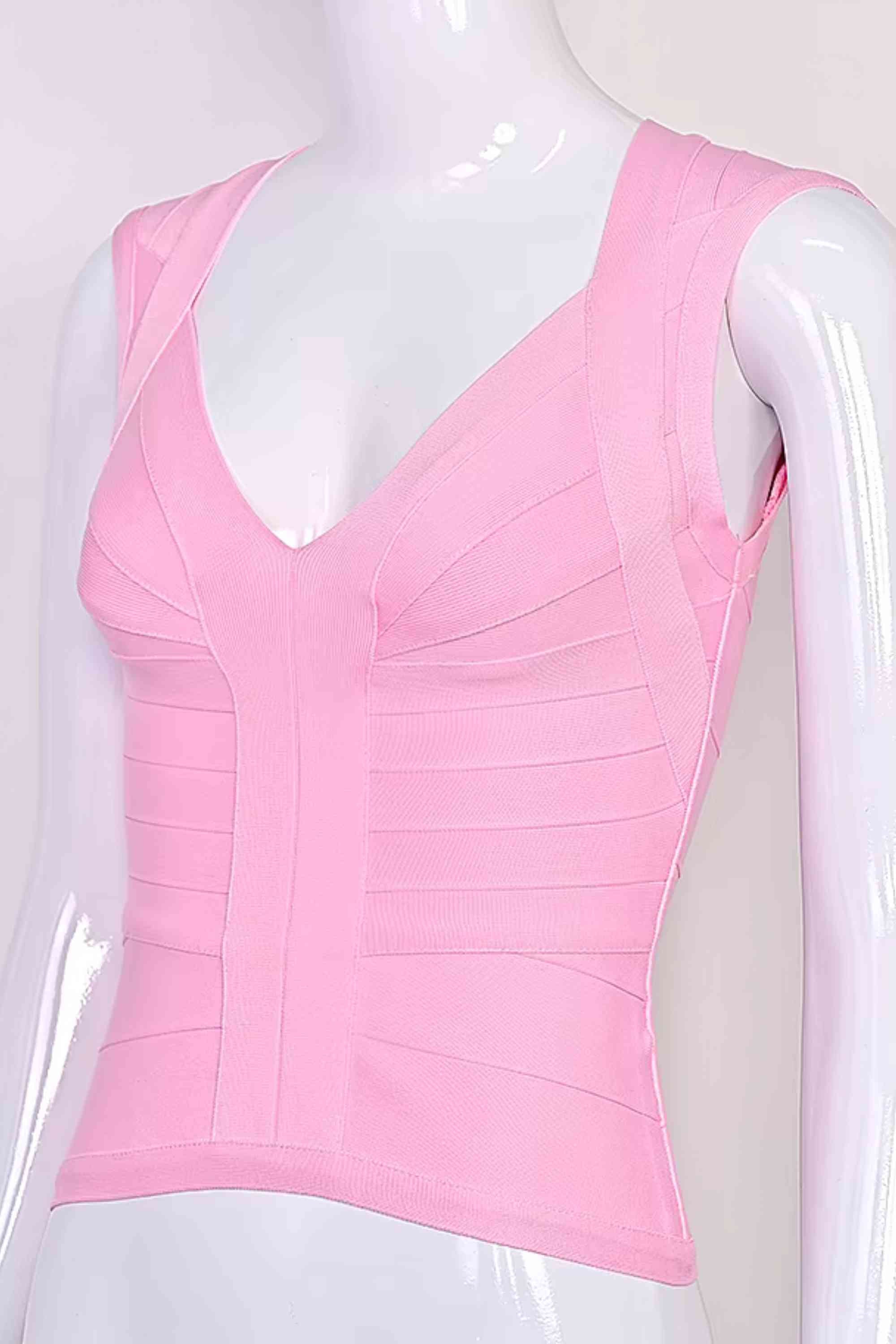 Woman wearing a figure flattering  Sabrina Bandage Top - Dusty Pink BODYCON COLLECTION Pty Ltd