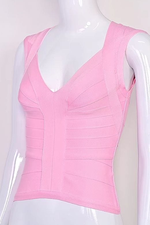 Woman wearing a figure flattering  Sabrina Bandage Top - Dusty Pink BODYCON COLLECTION Pty Ltd